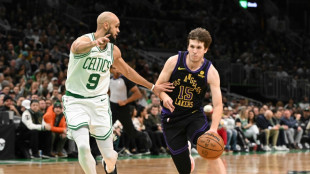 Shorthanded Lakers stun Celtics, Knicks stretch NBA win streak