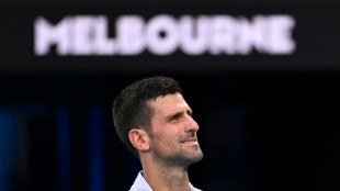 Djokovic admits 'trash talk' as he coasts through at Australian Open