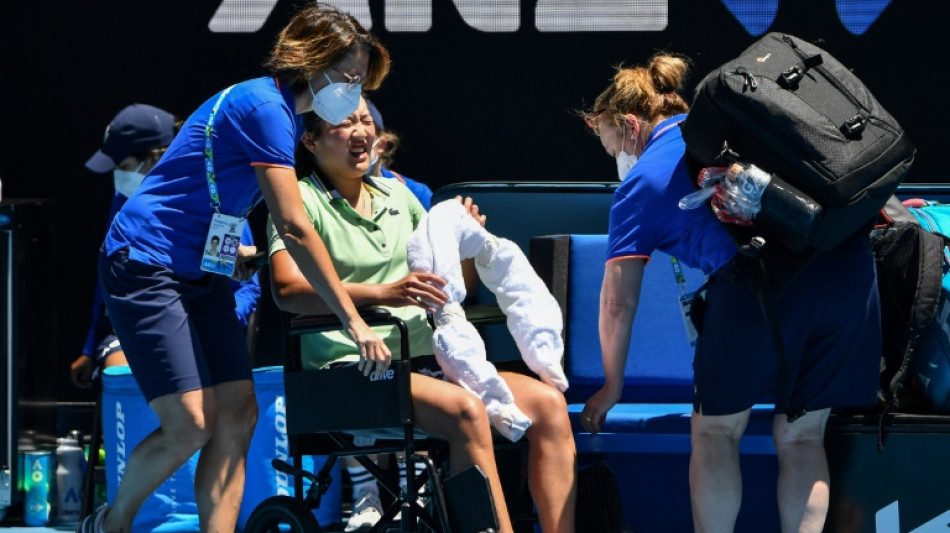 French player Tan taken off court in wheelchair