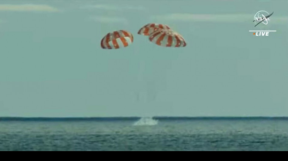 NASA capsule Orion splashes down after record-setting lunar voyage