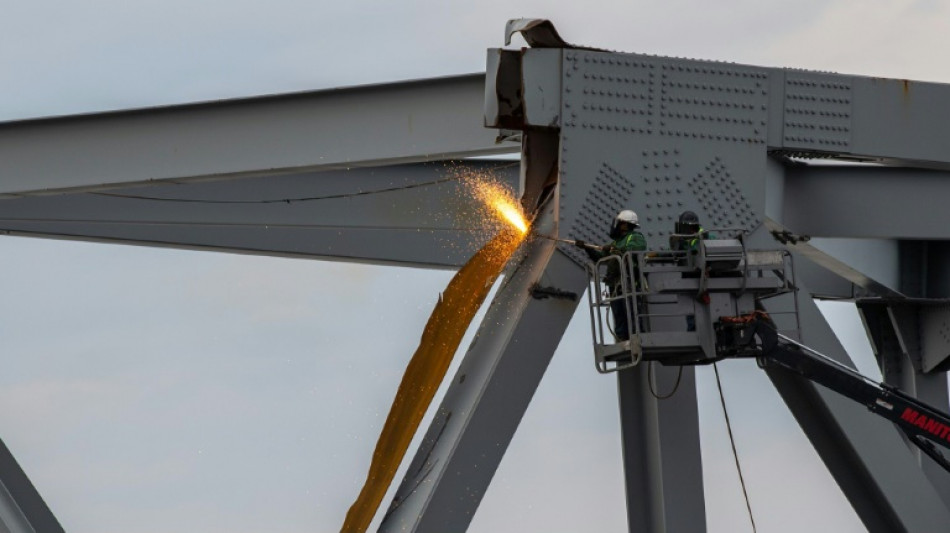 Baltimore bridge being cut up after ship collision