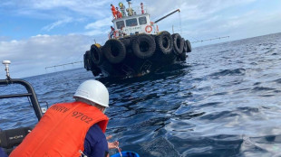 Oil from sunken tanker swamps central Philippine coast