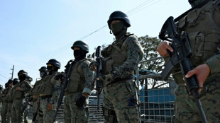 Ecuador prison raided as riot death toll climbs to 18