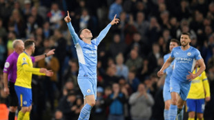 Man City beat Brighton to reclaim top spot 