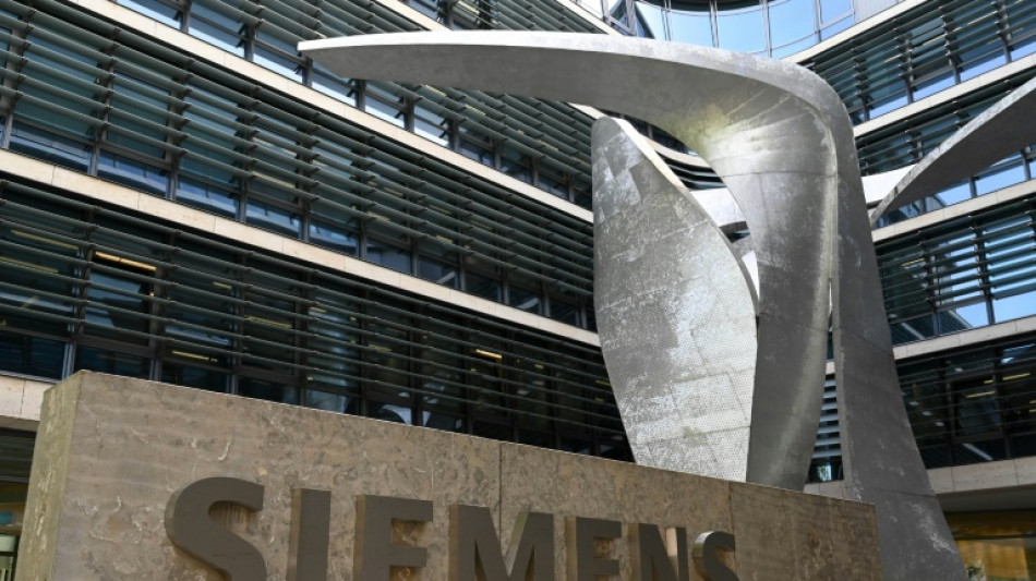 Siemens nets record profits, but outlook cautious