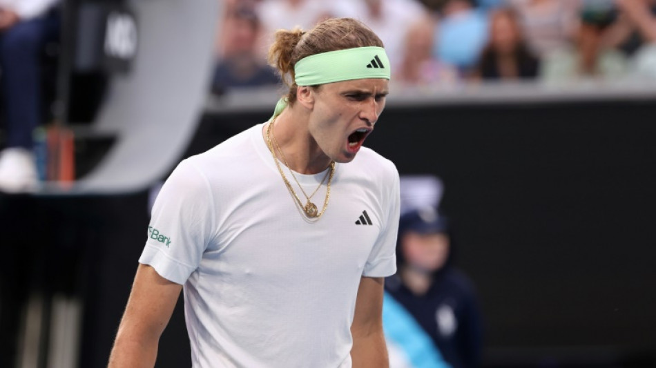 Zverev puts aside off-court worries to battle on at Australian Open