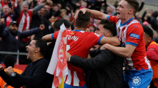 Girona top Liga with superb late Valencia comeback