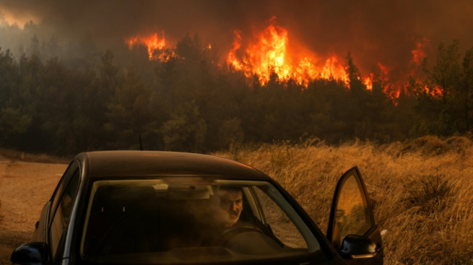 Greece's marble mountain burns in wildfires