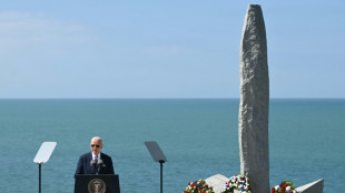 Biden urges US to protect democracy at key D-Day site