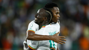 Defending champions Senegal beat Cameroon to book last-16 place