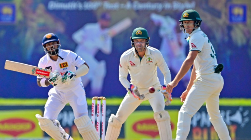 Smith and Carey tons put Australia into lead in second Sri Lanka Test